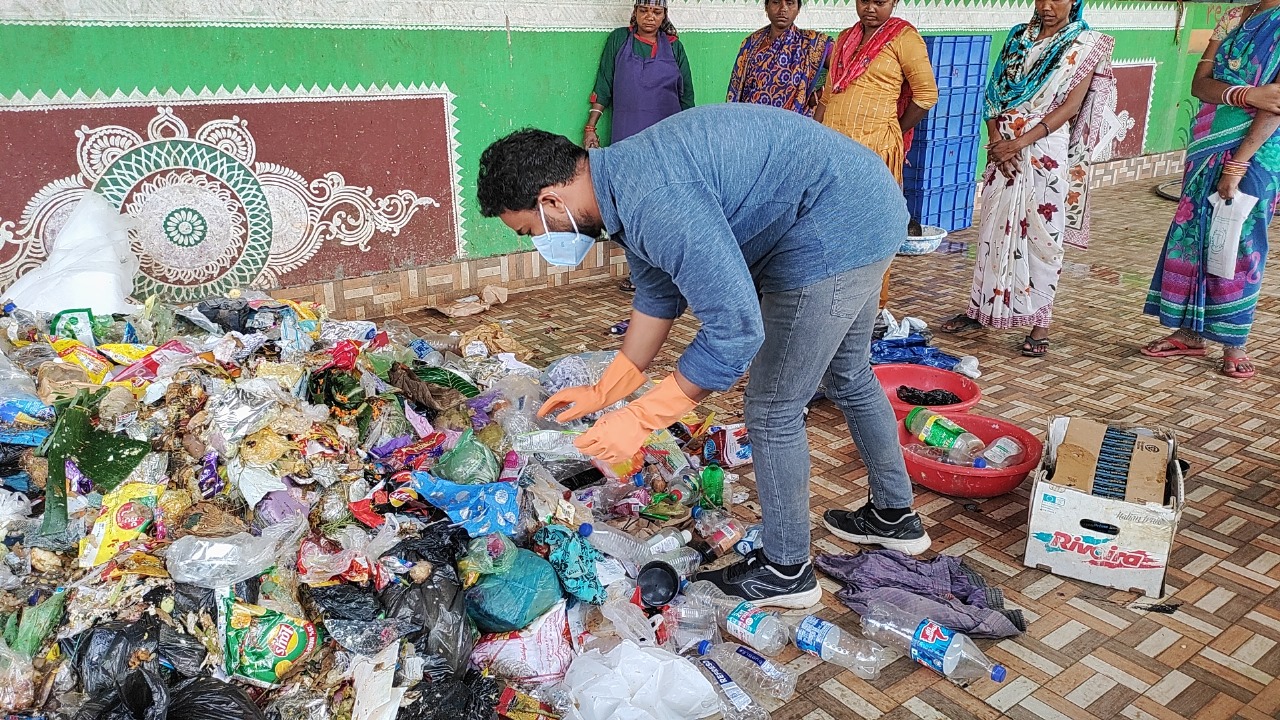 Odisha waste management team working with waste materials for recycling